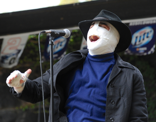 Jeff Lange | The Vindicator  Particle17's Chuck Shaffer sings during the band's performance of Led Zeppelin's The Ocean, Sunday afternoon at the Lawn-Con in Youngstown.