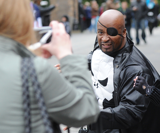 Jeff Lange | The Vindicator  Bond Pyant of Cleveland, dressed as Nick Fury from the Avengers, poses for a photo during Sunday's festivities at Lawn-Con in Youngstown.