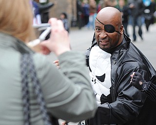 Jeff Lange | The Vindicator  Bond Pyant of Cleveland, dressed as Nick Fury from the Avengers, poses for a photo during Sunday's festivities at Lawn-Con in Youngstown.