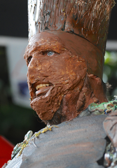 Jeff Lange | The Vindicator  Matt Skelly of Elyria smiles after being awarded first place for his costume made to look like Groot from the 2014 summer film Guardians of the Galaxy, Sunday afternoon in Youngstown during the Lawn-Con.