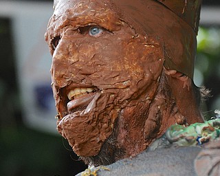 Jeff Lange | The Vindicator  Matt Skelly of Elyria smiles after being awarded first place for his costume made to look like Groot from the 2014 summer film Guardians of the Galaxy, Sunday afternoon in Youngstown during the Lawn-Con.