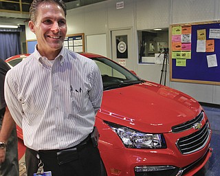        ROBERT K. YOSAY  | THE VINDICATOR...Steve Notar Donato..GM is celebrating its 50th anniversary and they have invited us on the premises to celebrate and to see the 2015 Cruze...-30-