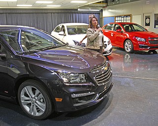        ROBERT K. YOSAY  | THE VINDICATOR.Michelle Baird tells about the new 2015's. ...GM is celebrating its 50th anniversary and they have invited us on the premises to celebrate and to see the 2015 Cruze...-30-
