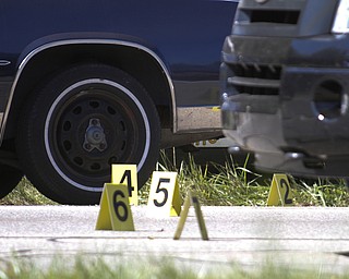        ROBERT K. YOSAY  | THE VINDICATOR..LIBERTY Ñ A man was shot and killed by police after a chase on state Route 11 just south of Tibbetts-Wick Road this morning..Lt.. Brian Holt of the Southington Barracks of the Ohio State Highway Patrol said deputies with the Trumbull County Sheriff's Office were chasing the vehicle, which was reported stolen, when troopers laid down stop sticks, which stopped the vehicle...-30-