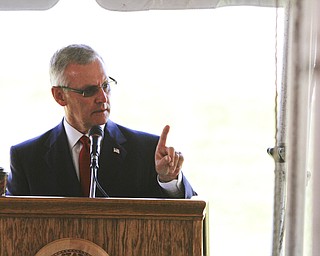        ROBERT K. YOSAY  | THE VINDICATOR..President Jim Tressel....... The 6,000-square-foot, two-story building on Wick Avenue will house the YSU Office of Veterans Affairs and is designed to help improve and expand services to military veterans and service members transitioning to life as students at YSU....-30-