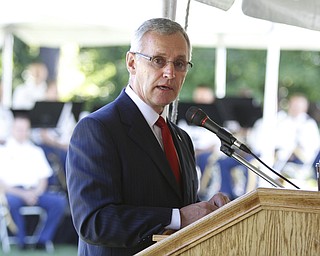        ROBERT K. YOSAY  | THE VINDICATOR..President Jim Tressel....... The 6,000-square-foot, two-story building on Wick Avenue will house the YSU Office of Veterans Affairs and is designed to help improve and expand services to military veterans and service members transitioning to life as students at YSU....-30-