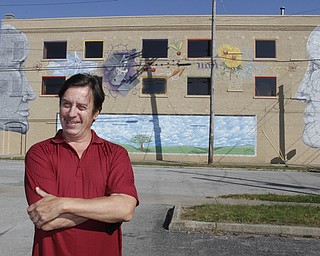        ROBERT K. YOSAY  | THE VINDICATOR..Two New Murals were shown today with the artists..  The area of Glenwood and Parkview where both buildings ( the former Park Inn and the LaFrance Building..part of YNDC - the Park Inn with Tommy Morgan formerly of Boardman - "face the future" and  La France with Jeremy Jarvis and the owner o fLaFrance Stephen Weiss...-30-