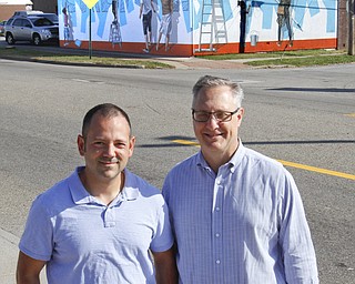        ROBERT K. YOSAY  | THE VINDICATOR..Two New Murals were shown today with the artists..  The area of Glenwood and Parkview where both buildings ( the former Park Inn and the LaFrance Building..part of YNDC - the Park Inn with Tommy Morgan formerly of Boardman - "face the future" and  La France with Jeremy Jarvis and the owner o fLaFrance Stephen Weiss...-30-