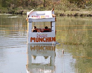        ROBERT K. YOSAY  | THE VINDICATOR..more creative and authenic as well as winning its heat...   "runs on dunkin'  of Zoey Novak  Morgan SMith and Sarah Spalding cruise for the win..The Annual Raider  Regatta done annually by 10th grade students at Memorial Park behind the old high School ...-30-