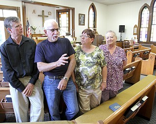 William D Lewis The Vindicator Calla Community Church is 150 years old..L-r Don Knauf-chrm of bd., Rev Jim Houston-Pastor, KAren Hazen -Secretary, Janet Paulin-Schlegel- Womens Missionary Society.