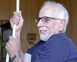 William D Lewis The Vindicator Calla Community Church is 150 years old. Pastor Jim Houston pulls a rope to ring the bell at the 150 year old church.