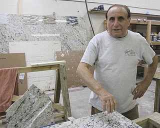 le d..William D Lewis The Vindicator Your Tile Center founder Joe Angelilli,  at his Struthers business.