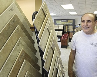 William D Lewis The Vindicator Your Tile Center founder Joe Angelilli, at this Struthers business.