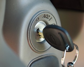 This photo shows a key in the ignition switch of a 2005 Chevrolet Cobalt in Alexandria, Va. Despite recall notices, thousands of news stories, highly publicized congressional hearings and two federal investigations, fewer than half of the roughly 2.36 million people driving Cobalts, Saturn Ions and other small cars with defective and potentially deadly ignition switches have had them replaced.