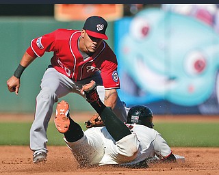 San Francisco Giants Brandon Belt is tagged out by Washington Nationals shortstop Ian Desmond on a steal attempt in the fourth inning during Game 3 of baseball’s NL Division Series in San Francisco, Monday. The Nationals won, 4-1.