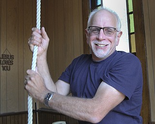 William D Lewis The Vindicator Calla Community Church is 150 years old. Pastor Jim Houston pulls a rope to ring the bell at the 150 year old church.