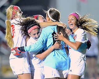 Jeff Lange | The Vindicator  Canfield goal keeper Raquel Abel celebrates her goal kick in the first half with teammates Bailey Fischer (far left), Anita Mancini (front), Alana Petracci (back) and Nikki Ghossain (right), Monday evening in Canfield during their matchup against Boardman.