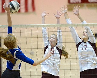 Jeff Lange | The Vindicator  Boardman's Katie Platt (5) and Amanda Lipke (17) look to block the spike of Lakeview's Alania Lytle during their matchup in Boardman, Tuesday evening.
