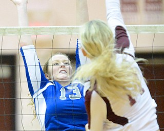 Jeff Lange | The Vindicator  Lakeview's Breanna Bucco stretches out to defend Amanda Lipke of Boardman's shot during their 5-game matchup in Boardman, Tuesday night.