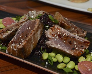 Katie Rickman | The Vindicator.The "Forbidden Ahi" at the Culinary Arts Restaurant in Boardman features "36 Hour Honolulu Fresh, Rare, Black forbidden Rice, Edamame, Sweet Brunette, and Pickled Radish" it costs $29.