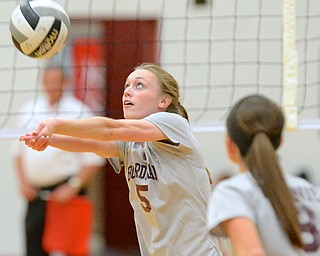 Jeff Lange | The Vindicator  Boardman's Katie Platt bumps the ball over the net in the first game of Boardman's matchup with Mooney, Wednesday evening in Youngstown.