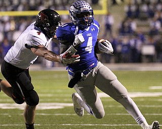 William D. Lewis The Vindicator Hubbard's George Hill(4) is stopped by Canfield's Jordan Brown (4) during 10102014 action in Hubbard.
