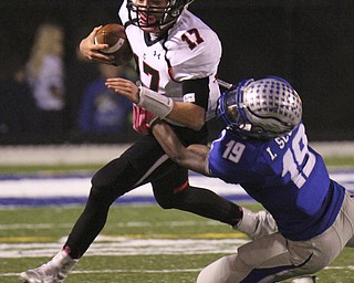 William D Lewis The Vindicator Canfield's Aaron Jenkins is brought down by Hubbard's Isiah Scott(19) hduring 10102014 action in Hubbard.