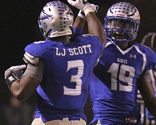 William D Lewis The Vindicator   LJ and Isaiah Scott bump fist after LJscored during 10-10 -14 game with Canfield.