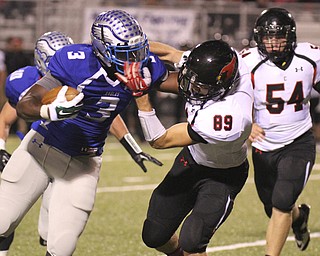 William D Lewis The Vindicator  Hubbard's LJ Scott(3) is stopped by Canfield's Andrew Hallof (9) during 10102014 astion in Hubbard.