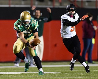 YOUNGSTOWN, OHIO - OCTOBER 10, 2014:Vito Penza #39 of Ursuline drops a would be interception after jumping the pass intended for Dylan Henderson #9 of Massillon during the 1st half of Friday nights OHSAA game at Stambaugh Stadium. (Photo by David Dermer/Youngstown Vindicator)