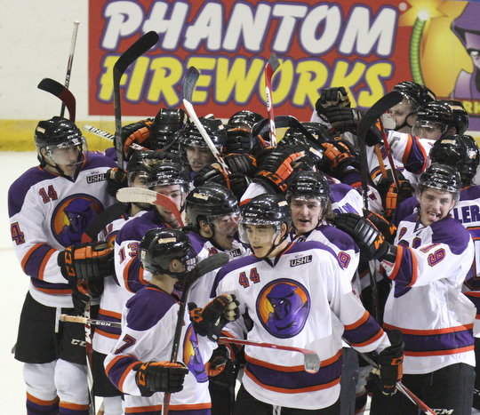 William D Lewis The Vindicator  Phantoms Kiefer Sherwood(44) center, gets congrats from team after winning game with a shoot out goal during 10-10-14 game with Bloomington Thunder.