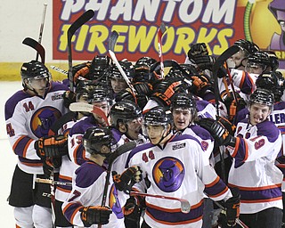 William D Lewis The Vindicator  Phantoms Kiefer Sherwood(44) center, gets congrats from team after winning game with a shoot out goal during 10-10-14 game with Bloomington Thunder.