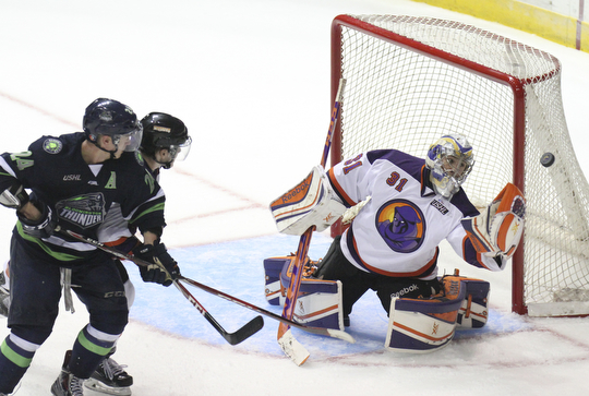William D Lewis The Vindicator  Phantoms goalieCollin DeAugustine(31) blocks a shot from ThundersMatt Mendelson(21) and Vince Pedrie(24)during 10-10-14 game with Bloomington Thunder.