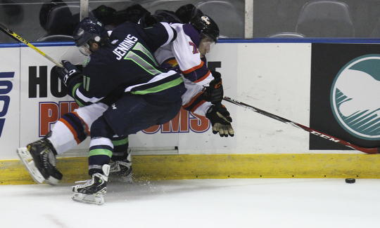 William D Lewis The Vindicator  Phantoms MaxLetunov(7) and Bloominton Jack Jenkins(11) collide during 10-10-14 game with Bloomington Thunder.