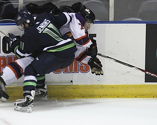 William D Lewis The Vindicator  Phantoms MaxLetunov(7) and Bloominton Jack Jenkins(11) collide during 10-10-14 game with Bloomington Thunder.