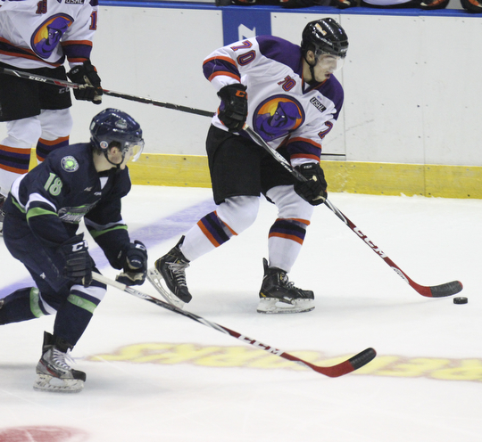 William D Lewis The Vindicator  Phantoms Ryan Lomberg(70) left, keeps the puck from Bloomingotns Van Barr(18) during 10-10-14 game with Bloomington Thunder.