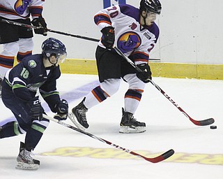 William D Lewis The Vindicator  Phantoms Ryan Lomberg(70) left, keeps the puck from Bloomingotns Van Barr(18) during 10-10-14 game with Bloomington Thunder.
