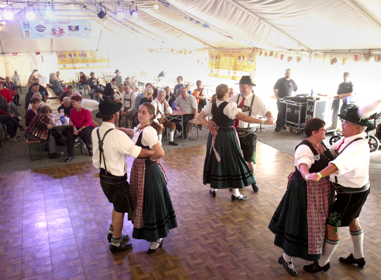 William D Lewis the vindicator Members of Alpen Schuhplattler Dancers of Pittsburg entertain during Oktoberfest Youngstown at Kravitz Deli in Liberty Sunday.