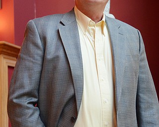 Katie Rickman | The Vindicator.D’Wayne Robinson poses for a photo in his Canfield home and discusses his children’s book Luvya Tree which he wrote after his wife passed away from cancer last year, he discusses the origins of the book on Thursday, Oct. 9, 2014.