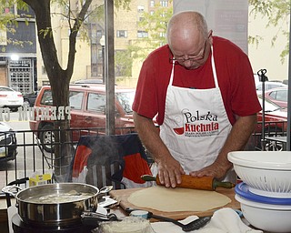 Katie Rickman | The Vindicator .Tad Siembida was the master pierogi maker during the National Pierogi Day Celebration on Thursday, Oct. 9, 2014. He made fresh pierogi as a demonstration during