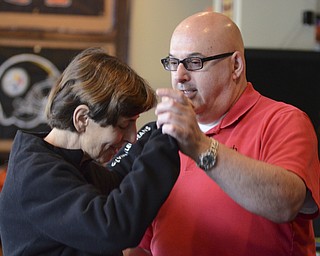 Katie Rickman | The Vindicator.Paula Horvath of Youngstown dances to polka music with Ken Shirilla of Boardman during the National Pierogi Day Celebration on Thursday, Oct. 9, 2014.