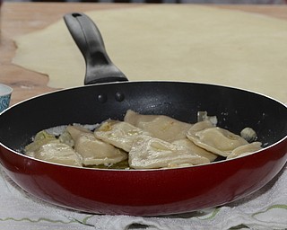 Katie Rickman | The Vindicator.National Pierogi Day was celebrated at Martini Brothers Burger Bar with homemade piergi and polka music on Thursday, Oct. 9, 2014.