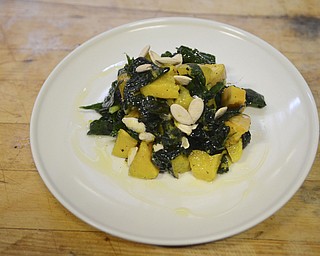 Katie Rickman | The Vindicator.The "Squash & Kale" salad at The Kitchen Post located in Friends Specialty downtown Youngstown features hot panini sandwiches  and salads daily.