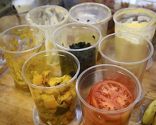 Katie Rickman | The Vindicator.Ross Fowler buys fresh ingredients daily for his restaurant  The Kitchen Post which features panini sandwiches and salads and is located in Friends Specialty.