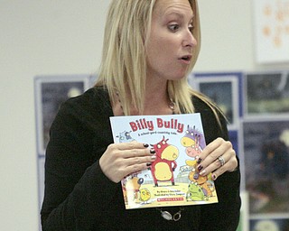        ROBERT K. YOSAY  | THE VINDICATOR..Making Kids Count took their Anti Bullying Campaign to the Boardman Local Schools as they made a stop at Robinhood Elementary-  to speak to second graders.. Diane Demetrios...  reads an anti bullying book to the students -30-