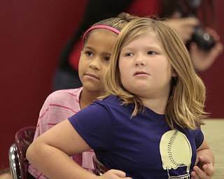        ROBERT K. YOSAY  | THE VINDICATOR..Making Kids Count took their Anti Bullying Campaign to the Boardman Local Schools as they made a stop at Robinhood Elementary-  to speak to second graders.. .Victoria Srines and Jenelle Hardy ( behind) listen to the story both are second graders .. -30-