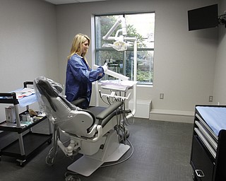        ROBERT K. YOSAY  | THE VINDICATOR..Refresh Dental is on the list of Inc. Magazines top 500 private fast growing companies in America.. Melissa Grischow works setting up a dental room.. almost all new equipment at the Boardman office just off South Ave on Andrea Ln...-30-