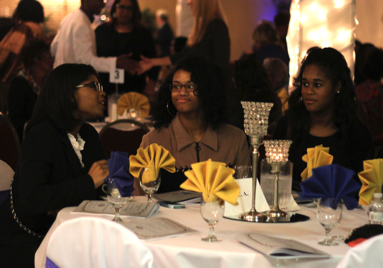 (L-R) Camille Bonner (16) of Cleveland, Danielle Harris (15) of Cleveland , and Kennedey Bell (17) of Hudson talk before the start of the NAACP banquit at the Mahoning Country Club in Liberty on Friday evening.  Dustin Livesay  |  The Vindicator  10/10/14  Mahoning Country Club