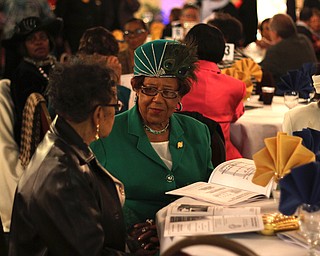 Rose Yates (left) and Beatrice Dixon both of Youngstown socialize before the start of the NAACP banquit at the Mahoning Country Club in Liberty on Friday evening.  Dustin Livesay  |  The Vindicator  10/10/14  Mahoning Country Club