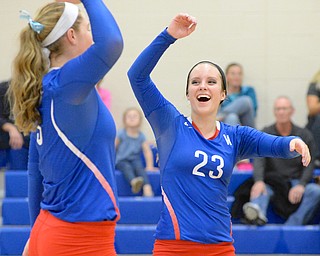 Jeff Lange | The Vindicator  Reserve's Marissa Phipps (23) celebrates after scoring a point over Sebring during Thursday night's matchup at Western Reserve. The ladies beat Sebring with ease in 3 games.